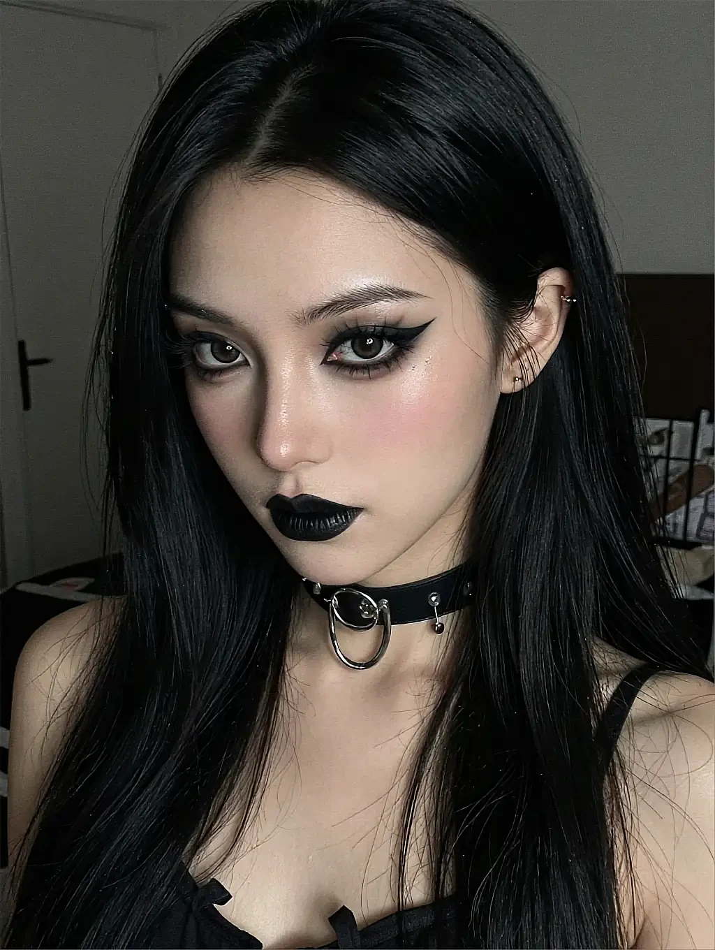 Fictional AI character with dark makeup and a choker at a window above the city